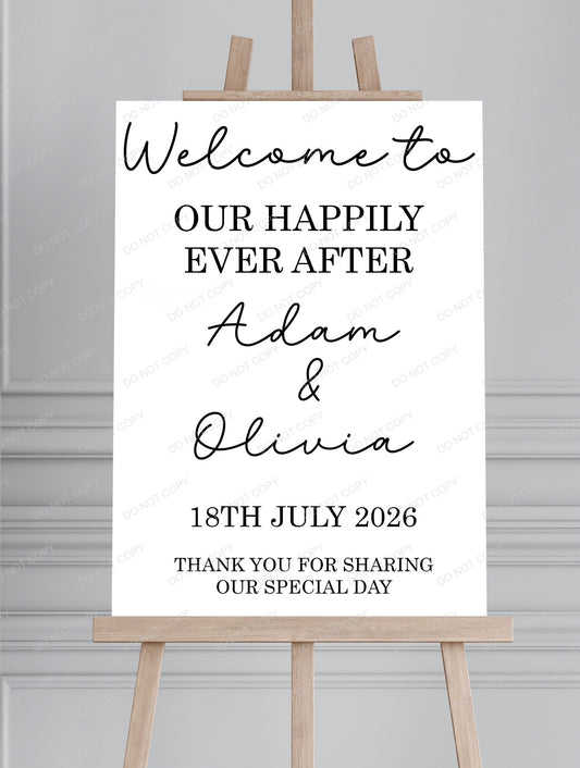 Wedding welcome sign on a wooden easel with personalized text against a gray wall.